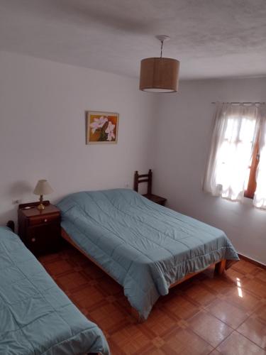 Llit o llits en una habitació de Casa Grande