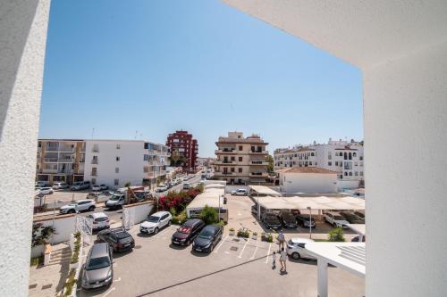 an aerial view of a parking lot in a city at Hotel Agaró in Chipiona