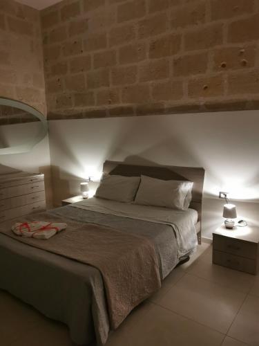 Posteľ alebo postele v izbe v ubytovaní Piccola Stella