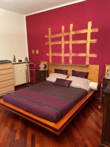 A bed or beds in a room at ZEN APARTMENT LOCATED IN TURIN PRE HILL