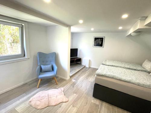 Postel nebo postele na pokoji v ubytování Ferienhaus Sonnendeck 2