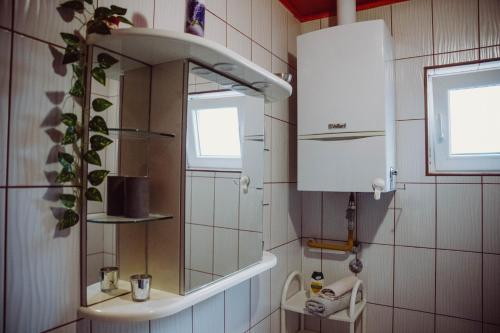 Ванная комната в Apartman Tea i Studio apartman Toni