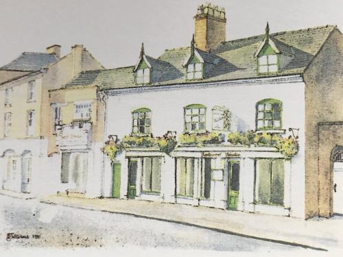 un dibujo de una casa blanca en Sebastians, en Oswestry