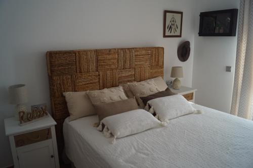 Posteľ alebo postele v izbe v ubytovaní Casa Oliveres Beach en L' Ampolla