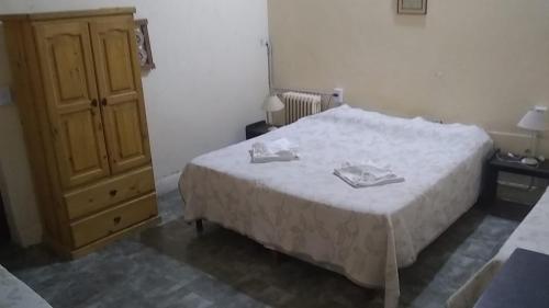 Ένα ή περισσότερα κρεβάτια σε δωμάτιο στο Gran Aldea Hotel