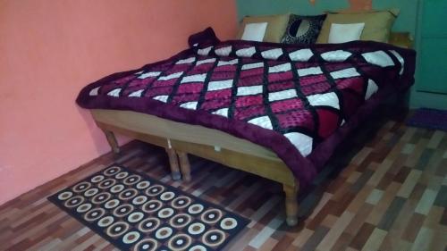 Cama o camas de una habitación en Moon Hotel Tungnath