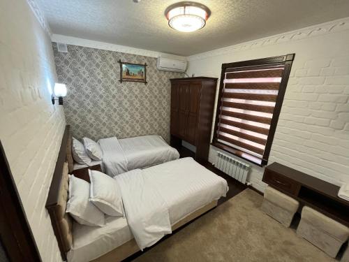 Katil atau katil-katil dalam bilik di Hotel Grand Marakand