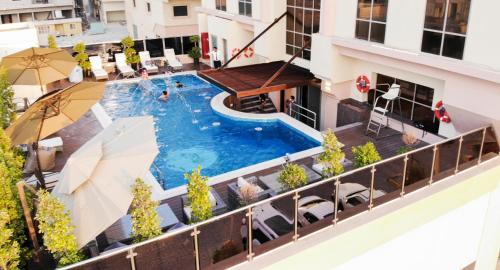 an overhead view of a swimming pool on a building at Royal View Hotel in Ras al Khaimah