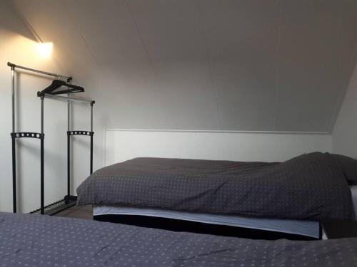 Postel nebo postele na pokoji v ubytování Huize Visser