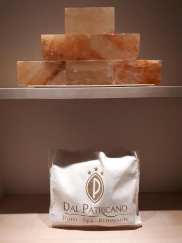 a pile of bricks on a shelf with a bag at Dal Patricano in Frosinone