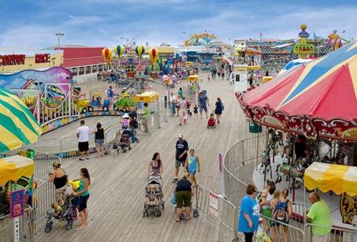 a crowd of people at an amusement park at Spacious beach home ready for Family Memories! in Point Pleasant Beach