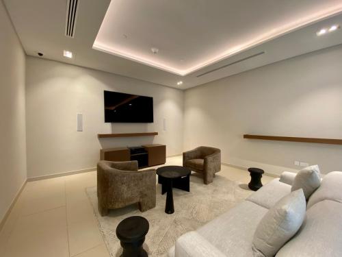 TV o dispositivi per l'intrattenimento presso EDEN'S Homes & Villas - 52-42 Emaar