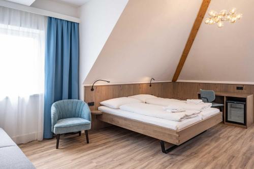 Säng eller sängar i ett rum på Villa Flöckner Bed & Breakfast