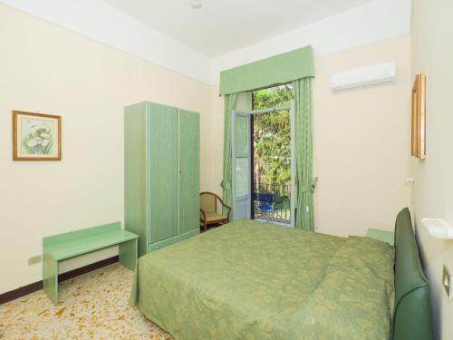 Katil atau katil-katil dalam bilik di Hotel Delle Palme