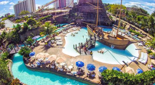 an aerial view of a water park at a theme park at Villas diRoma com um dia no Acqua Park, Splash e Slide in Caldas Novas