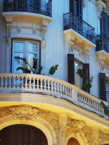 Historic 19th-Century Apartment with Balcony Overlooking Plaza