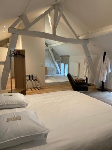 Postel nebo postele na pokoji v ubytování B&B elzartwinning