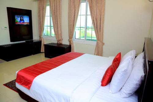 Katil atau katil-katil dalam bilik di Panorama Portico Hotel, Juba