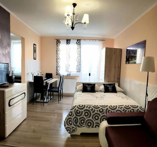 Posteľ alebo postele v izbe v ubytovaní Apartment GLAMOUR Downtown balcony