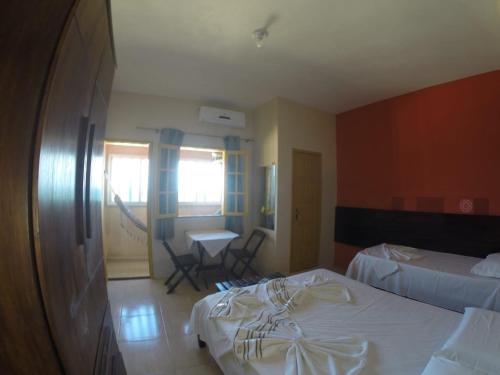 Katil atau katil-katil dalam bilik di Apartamentos da Coló