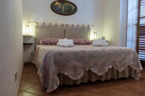 A bed or beds in a room at La Palma
