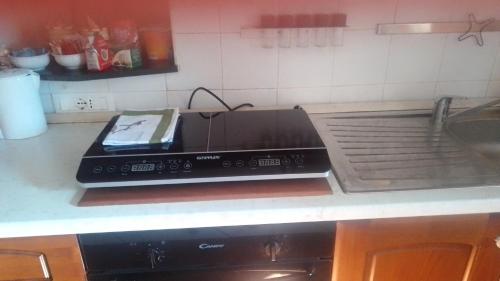 A kitchen or kitchenette at Casa Augusto