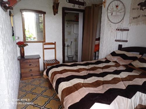 Voodi või voodid majutusasutuse Chalé Alto toas
