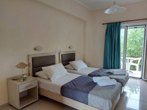 A bed or beds in a room at Antonio Studios