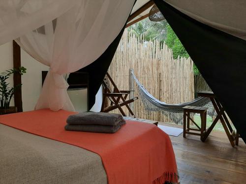 Katil atau katil-katil dalam bilik di Pousada Glamping Algodões