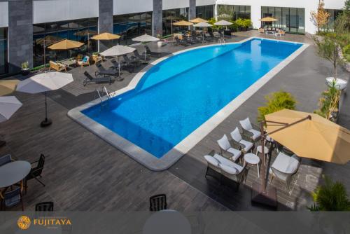an overhead view of a swimming pool on a building at FUJITAYA Querétaro in Querétaro