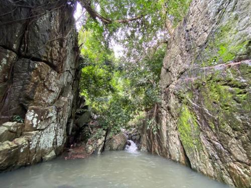 a small pool of water in a rock cave at Coconut Escapes in Kurunegala