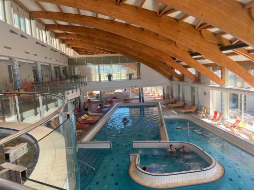 The swimming pool at or close to Tóparti Wellness Apartman Delux