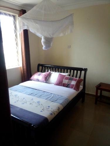 Ein Bett oder Betten in einem Zimmer der Unterkunft Dich Comfort Hotel University Branch