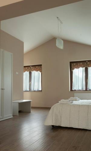 Ένα ή περισσότερα κρεβάτια σε δωμάτιο στο Agriturismo La Follonella