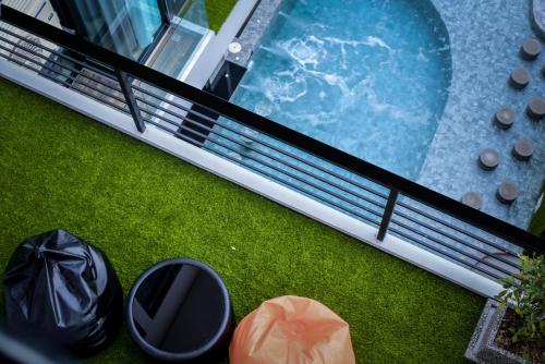 The swimming pool at or close to OneLoft Hotel