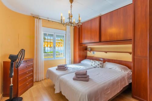 A bed or beds in a room at Casa dos Leones