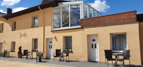 a building with a large window on top of it at Pension Lenz in Sassnitz
