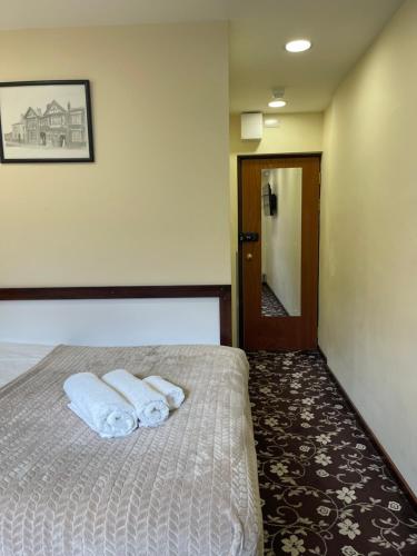 Postel nebo postele na pokoji v ubytování The Ormonde Guesthouse