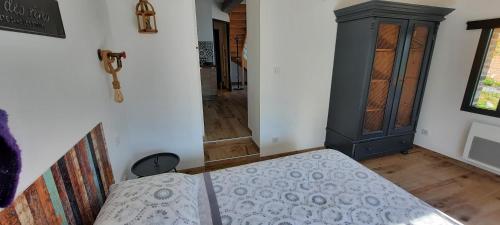 Postel nebo postele na pokoji v ubytování L atelier des rêves