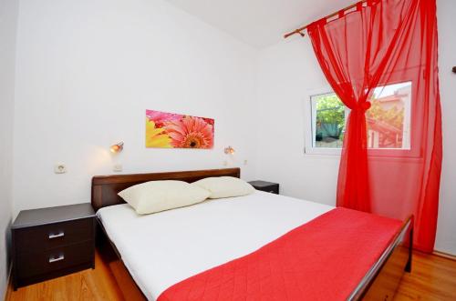 Postel nebo postele na pokoji v ubytování Apartments Jadranka