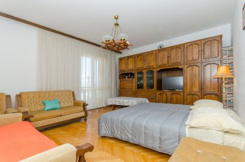 Ένα ή περισσότερα κρεβάτια σε δωμάτιο στο Apartments KATA