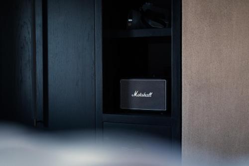 a black cabinet with a monday sign on it at Santorini Sky, The Lodge in Pirgos