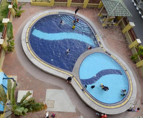 Výhled na bazén z ubytování Puteri Bay Hotel nebo okolí