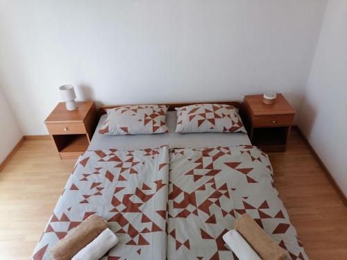 Postel nebo postele na pokoji v ubytování Apartments Zdenka