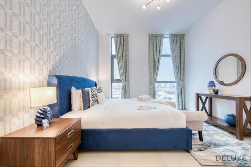 Postel nebo postele na pokoji v ubytování Fresh 2BR at Mudon Views 4 Dubailand by Deluxe Holiday Homes