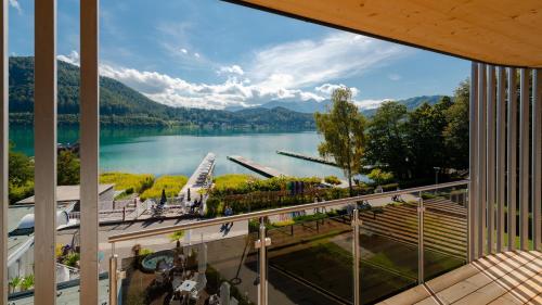 a view of a lake from a building at Seewirt Apartments in Klopein am Klopeiner See
