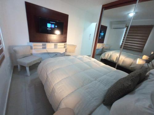 Postel nebo postele na pokoji v ubytování Lia Amanda Edificio 5