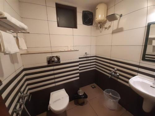 Ванная комната в KTDC Folk Land, Parassinikadavu