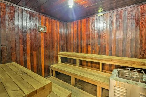 a wooden room with benches and a table at Frisco Condo with Pool Access Walk to Main Street! in Frisco
