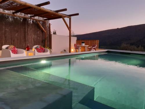 a swimming pool in a house at Villas de Aire in Mira